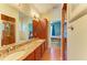 Double vanity bathroom with granite countertops and walk-in shower at 7606 91St E St, Palmetto, FL 34221