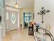 Elegant entryway with a stained-glass door and tiled flooring at 7606 91St E St, Palmetto, FL 34221