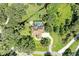 Aerial view showcasing home's expansive lot and lush landscaping at 7606 91St E St, Palmetto, FL 34221
