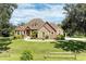 House front with stone and stucco exterior at 7606 91St E St, Palmetto, FL 34221