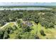 Home nestled in a tranquil, wooded setting near a lake at 7606 91St E St, Palmetto, FL 34221