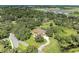 Home on a large lot with circular driveway, near water at 7606 91St E St, Palmetto, FL 34221