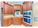 Modern kitchen with stainless steel appliances and ample counter space at 7606 91St E St, Palmetto, FL 34221