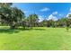 Expansive backyard with tropical landscaping at 7606 91St E St, Palmetto, FL 34221