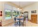 Breakfast nook with glass table and view of the backyard at 7606 91St E St, Palmetto, FL 34221
