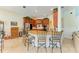 Kitchen island with seating and stainless steel appliances at 7606 91St E St, Palmetto, FL 34221