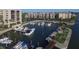 Marina with many boats and a gazebo in a waterfront community at 5855 Midnight Pass Rd # 420, Sarasota, FL 34242