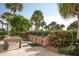 Outdoor grilling area with brick barbecue stations and seating at 5855 Midnight Pass Rd # 420, Sarasota, FL 34242