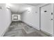 Clean condo hallway with carpeting and modern lighting at 5855 Midnight Pass Rd # 420, Sarasota, FL 34242