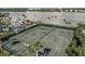 Two tennis courts with waterfront views at 5855 Midnight Pass Rd # 420, Sarasota, FL 34242