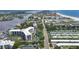 Aerial view of a condo building near beach and waterway at 5855 Midnight Pass Rd # 420, Sarasota, FL 34242