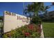 Exterior photo of the HarborTowers Yacht & Racquet Club building sign at 5855 Midnight Pass Rd # 420, Sarasota, FL 34242