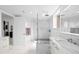 Contemporary bathroom with glass shower, modern vanity, and sleek fixtures at 128 Golden Gate Pt # 501B, Sarasota, FL 34236