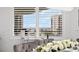 Dining room area, with a bright natural view of the water at 128 Golden Gate Pt # 501B, Sarasota, FL 34236