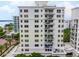 Condo with multiple balconies, on premise parking and lush landscaping at 128 Golden Gate Pt # 501B, Sarasota, FL 34236
