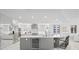 Modern kitchen features stainless steel appliances, a wine cooler, and an island with barstool seating at 128 Golden Gate Pt # 501B, Sarasota, FL 34236