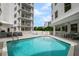 Large swimming pool with multiple seating and tanning areas in this resort-like complex at 128 Golden Gate Pt # 501B, Sarasota, FL 34236