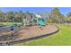 Community playground featuring slides, climbing structures, and ample space for recreational activities at 16916 Rosedown Gln, Parrish, FL 34219