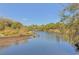 Scenic river view perfect for boating and fishing in a peaceful natural setting at 16916 Rosedown Gln, Parrish, FL 34219