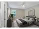 Spacious bedroom with neutral decor and plenty of natural light at 7745 Sandhill Lake Dr, Sarasota, FL 34241