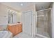 Bathroom with vanity, shower, and bathtub at 606 Riviera Dunes Way # 303, Palmetto, FL 34221