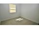 Spacious bedroom with window and light flooring at 3519 17Th E St, Bradenton, FL 34208