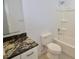 Clean bathroom with granite countertop and bathtub at 3519 17Th E St, Bradenton, FL 34208