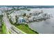 Aerial view showing condo location near water at 128 Golden Gate Pt # 501B, Sarasota, FL 34236