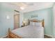 Guest bedroom with full bed and closet at 6263 Midnight Pass Rd # 301, Sarasota, FL 34242