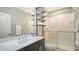 Clean bathroom with walk-in shower and modern vanity at 16916 Rosedown Gln, Parrish, FL 34219