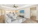 Spacious living room with comfortable sectional sofa at 16916 Rosedown Gln, Parrish, FL 34219