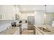 Sleek kitchen, granite counters, stainless steel appliances at 16916 Rosedown Gln, Parrish, FL 34219