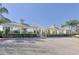 Resort-style pool area with covered seating and parking at 16916 Rosedown Gln, Parrish, FL 34219