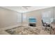 Bright home office features a large window, plush rug, and built-in workspace at 16916 Rosedown Gln, Parrish, FL 34219