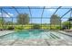 Inviting screened-in pool area with a spacious patio at 16916 Rosedown Gln, Parrish, FL 34219
