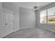 Bright bedroom with grey walls and vinyl flooring at 519 Catalina Isles Cir, Venice, FL 34292