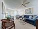 Relaxing living room with ample seating and a ceiling fan at 3333 26Th E Ave # 1230, Bradenton, FL 34208