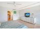 Bedroom with built-in dresser and access to a large closet at 603 Longboat Club Rd # 602N, Longboat Key, FL 34228