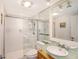 Clean bathroom with walk-in shower and updated vanity at 603 Longboat Club Rd # 602N, Longboat Key, FL 34228