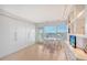 Bright office with built-in shelving, balcony access, and ocean view at 603 Longboat Club Rd # 602N, Longboat Key, FL 34228