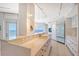 White kitchen with ocean views and modern finishes at 603 Longboat Club Rd # 602N, Longboat Key, FL 34228