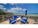 Enjoy the ocean view from this furnished patio area at 603 Longboat Club Rd # 602N, Longboat Key, FL 34228