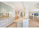 Bright white kitchen features quartz countertops and ample cabinet space at 603 Longboat Club Rd # 602N, Longboat Key, FL 34228