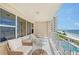Relaxing balcony with ocean and pool views at 603 Longboat Club Rd # 602N, Longboat Key, FL 34228