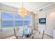 Bright dining area with stunning ocean view at 603 Longboat Club Rd # 602N, Longboat Key, FL 34228