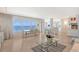 Open concept living room and kitchen with ocean views at 603 Longboat Club Rd # 602N, Longboat Key, FL 34228