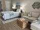 Main bedroom with cozy sitting area and ample natural light at 3600 Lake Bayshore Drive Bld. K # 221, Bradenton, FL 34205