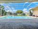 Inviting screened-in pool with spa and ample deck space at 4003 Twin Rivers Trl, Parrish, FL 34219