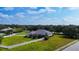 Aerial view of a home with a large backyard and white fence at 4003 Twin Rivers Trl, Parrish, FL 34219