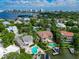 Breathtaking aerial view of waterfront homes, complete with pools, spas, and private boat docks at 1389 Harbor Dr, Sarasota, FL 34239
